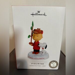 NIB Hallmark Peanuts 2021 Figurine “All Christmas needs is a little love.”